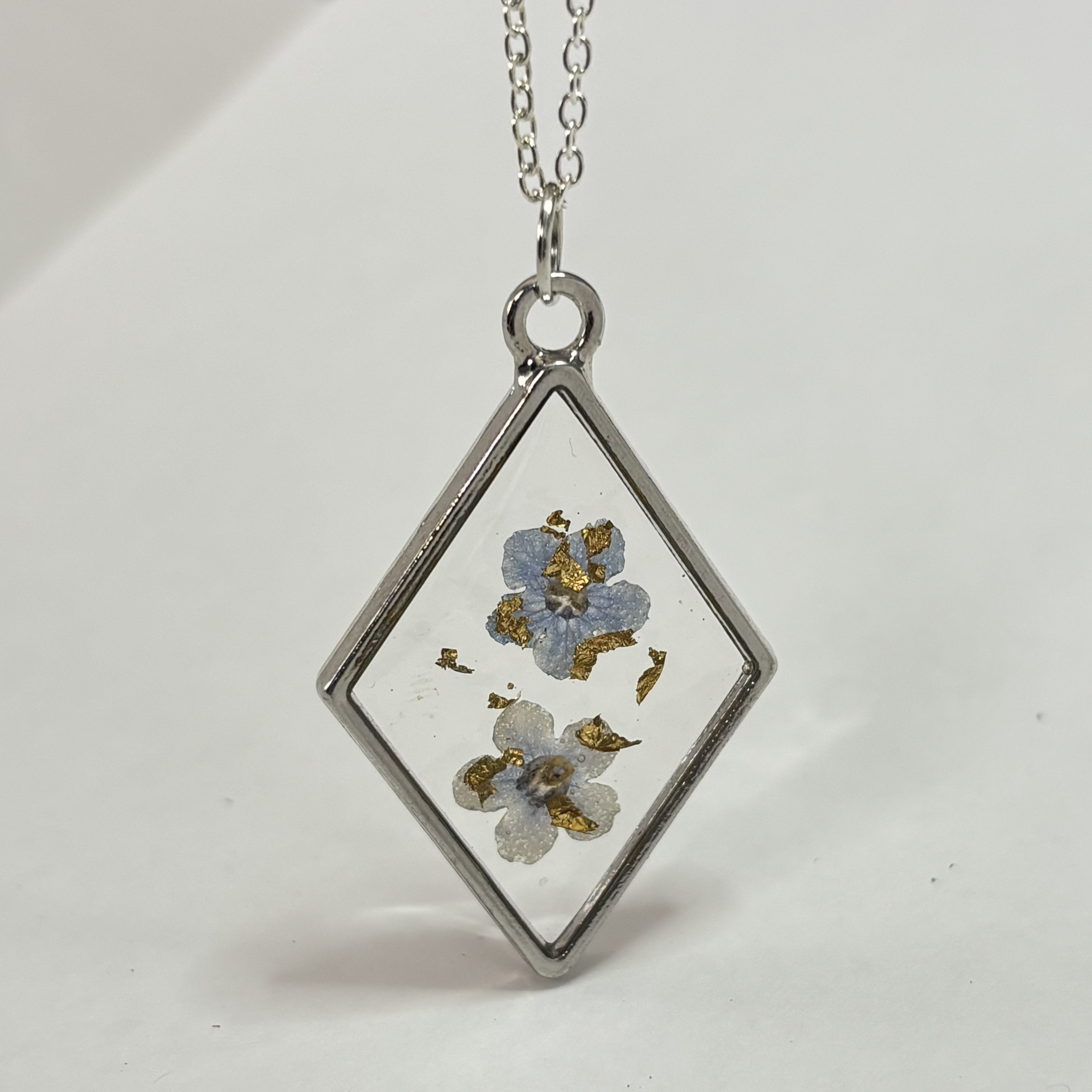 Back view of forget-me-not necklace