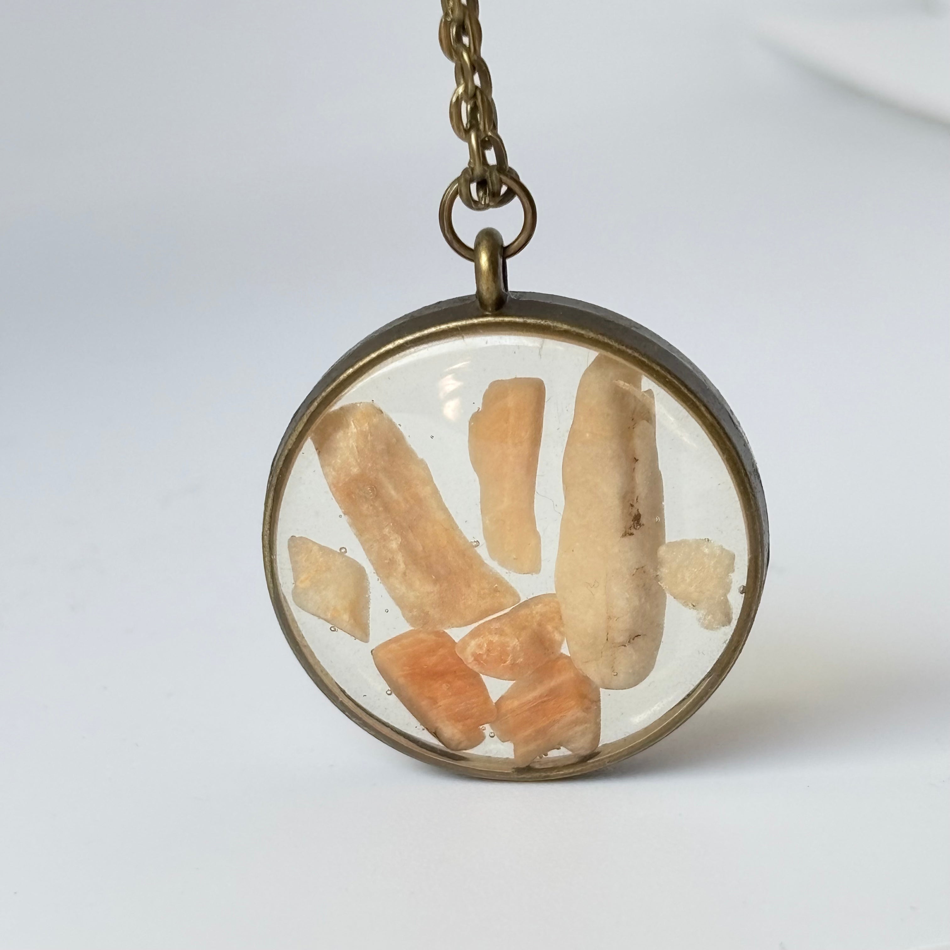 Handmade rose quartz crystal pendant necklace on chain