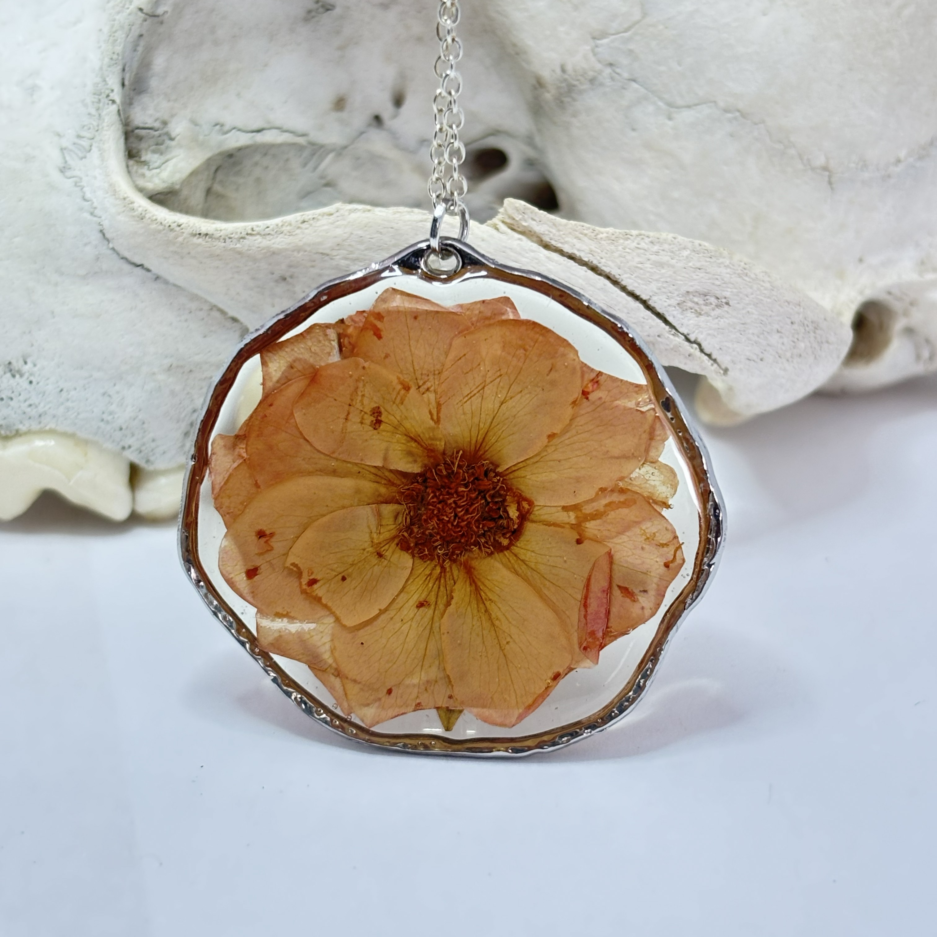 Pressed rose necklace with real flower in clear resin pendant